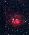 Laguna Nebula and a satellite