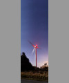 A wind turbine, the Liitle and Big Dipper and Cassiopeia