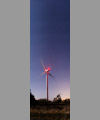 A wind turbine, the Liitle and Big Dipper and Cassiopeia